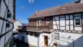Ansicht mit Terrasse im OG