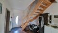 Eingangsbereich mit Holztreppe